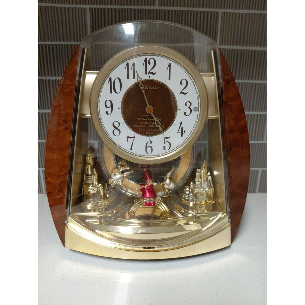 Seiko QXW115BRH Contemporary Fantasy Swing Musical Motion Decorative Clock